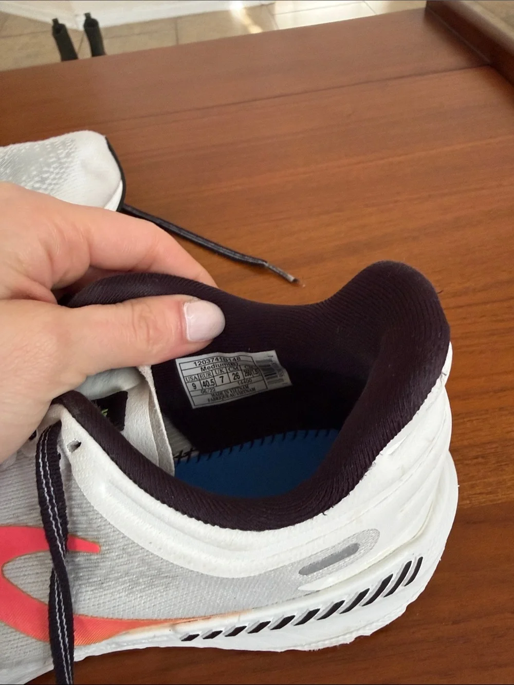 Brooks White Running Sneakers with Pink Accent and Black Trim
